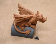 grey and terracotta dragon finial